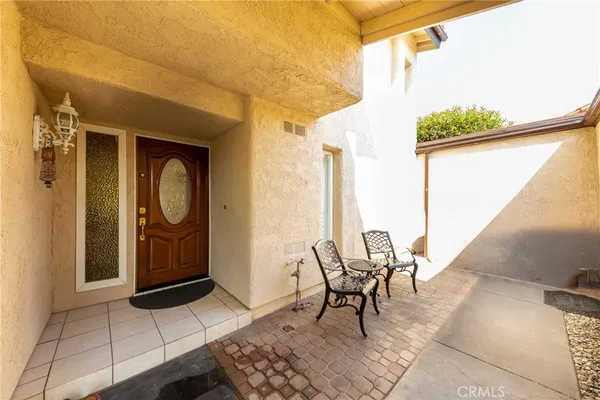 a workspace with furniture window and wooden floor