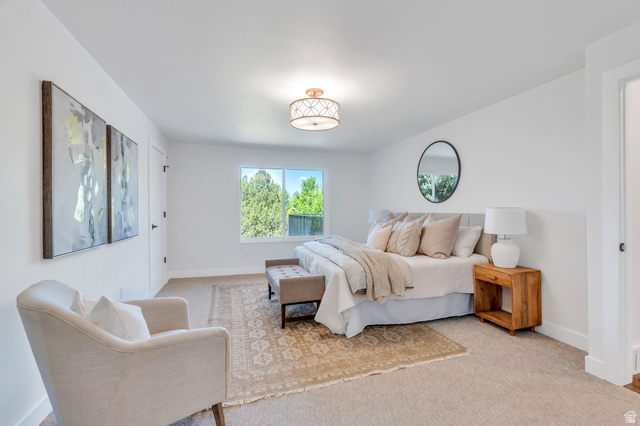 3813 North Foothill Drive Provo, UT 84604 - Photo 25 of 71 Carpeted bedroom with a single window, a ceiling-mounted light fixture, and a built-in closet with a dark door