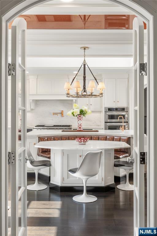 7-11 Stokes Farm Road Old Tappan, NJ 07675 - Photo 17 of 40 a kitchen with a sink cabinets and window