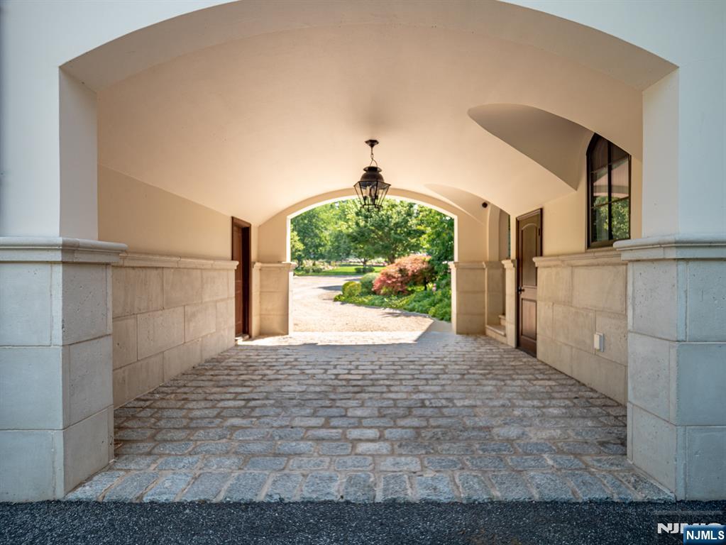 7-11 Stokes Farm Road Old Tappan, NJ 07675 - Photo 31 of 40 a view of entryway with a floor to ceiling window
