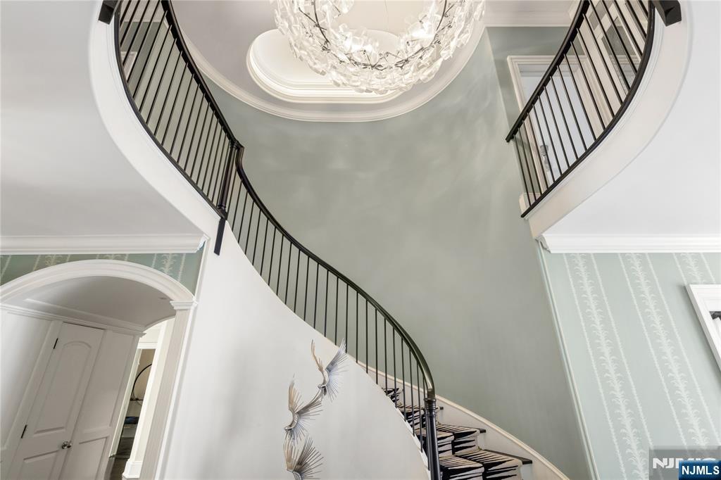 7-11 Stokes Farm Road Old Tappan, NJ 07675 - Photo 7 of 40 a view of entryway and hall with wooden floor