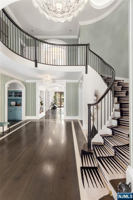 7-11 Stokes Farm Road Old Tappan, NJ 07675 - Photo 8 of 40 a view of an entryway with wooden floor