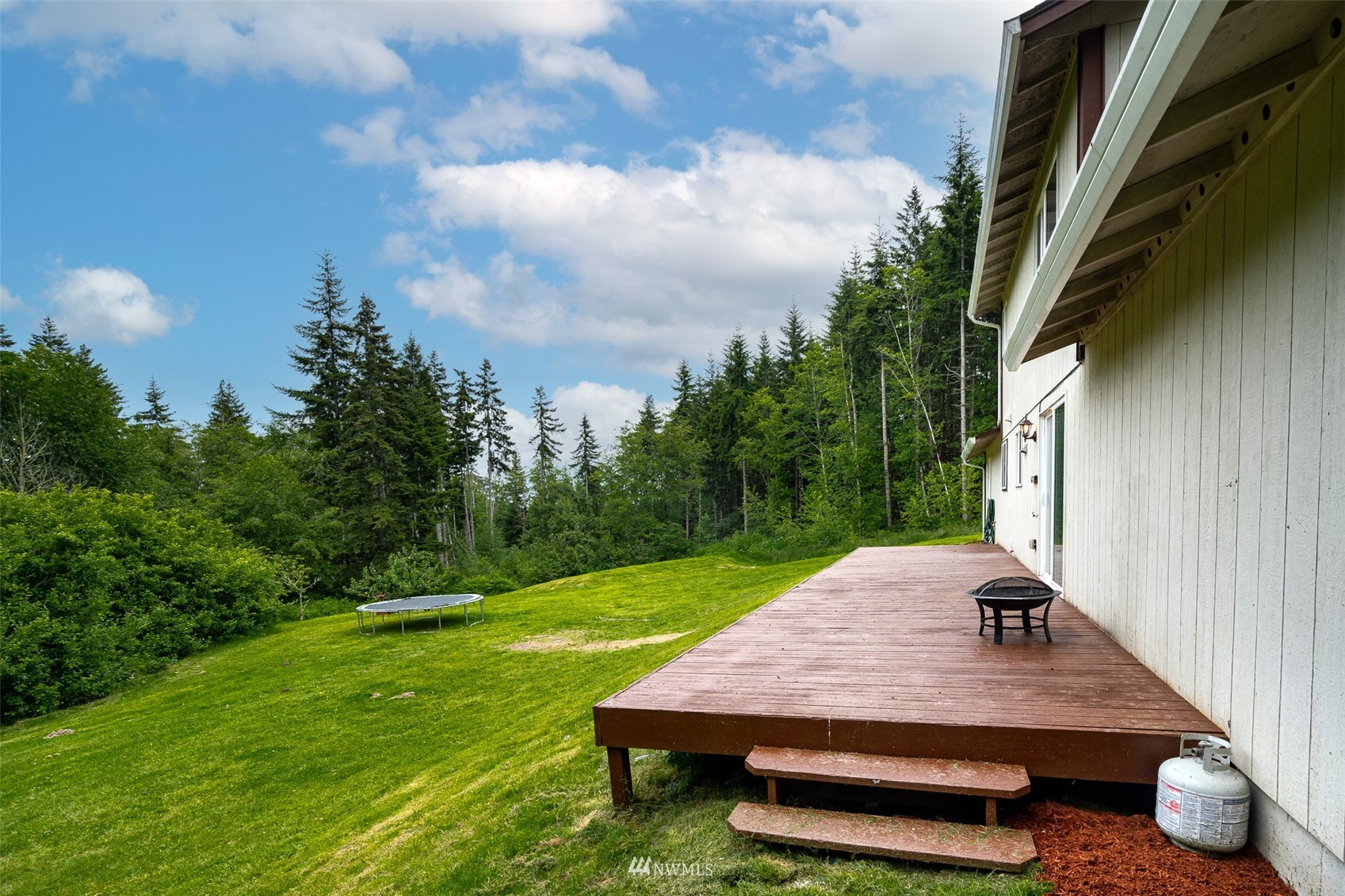 181 Crego Ridge Road Chehalis, WA 98532 - Photo 32 of 33 a view of a backyard with sitting area