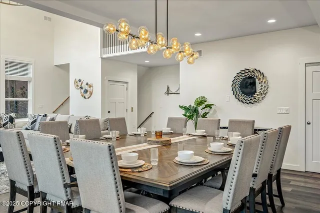 a view of a dining room with furniture window and outside view
