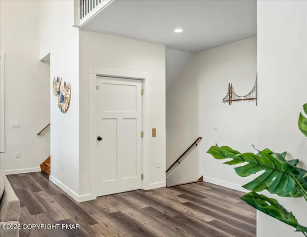 a bathroom with a toilet and shower
