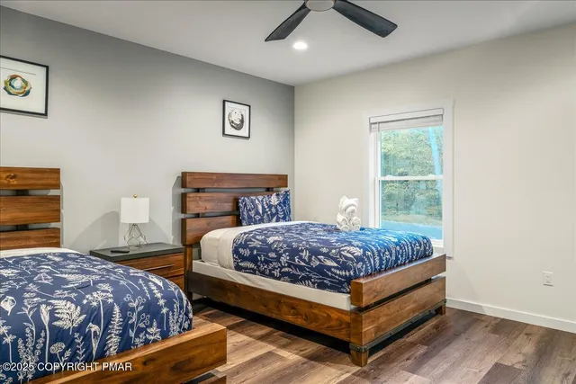 a bathroom with a toilet sink and shower