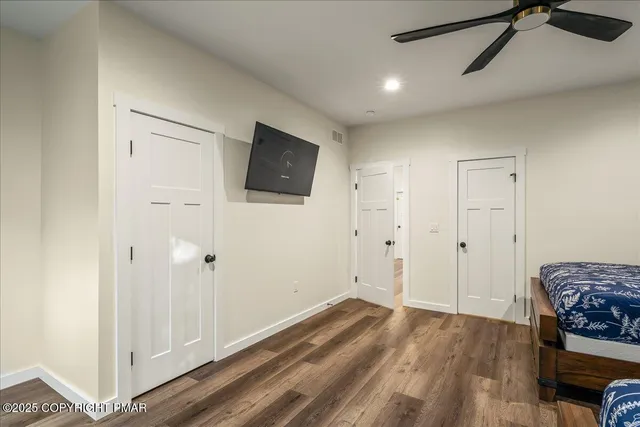 a view of a chairs and couches in the roof deck
