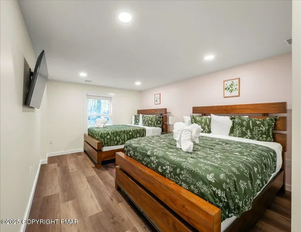 a view of a tables and chairs in a backyard