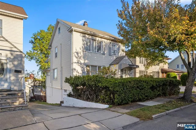 a view of a house with a garden
