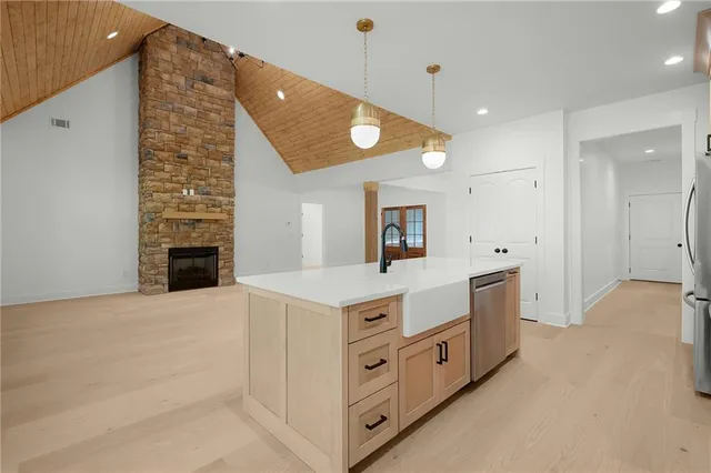 a kitchen with a stove and a kitchen