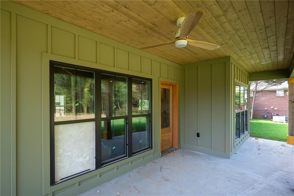 130 Cambridge Court Calhoun, GA 30701 - Photo 44 of 46 a view of a room with large windows and a outdoor space
