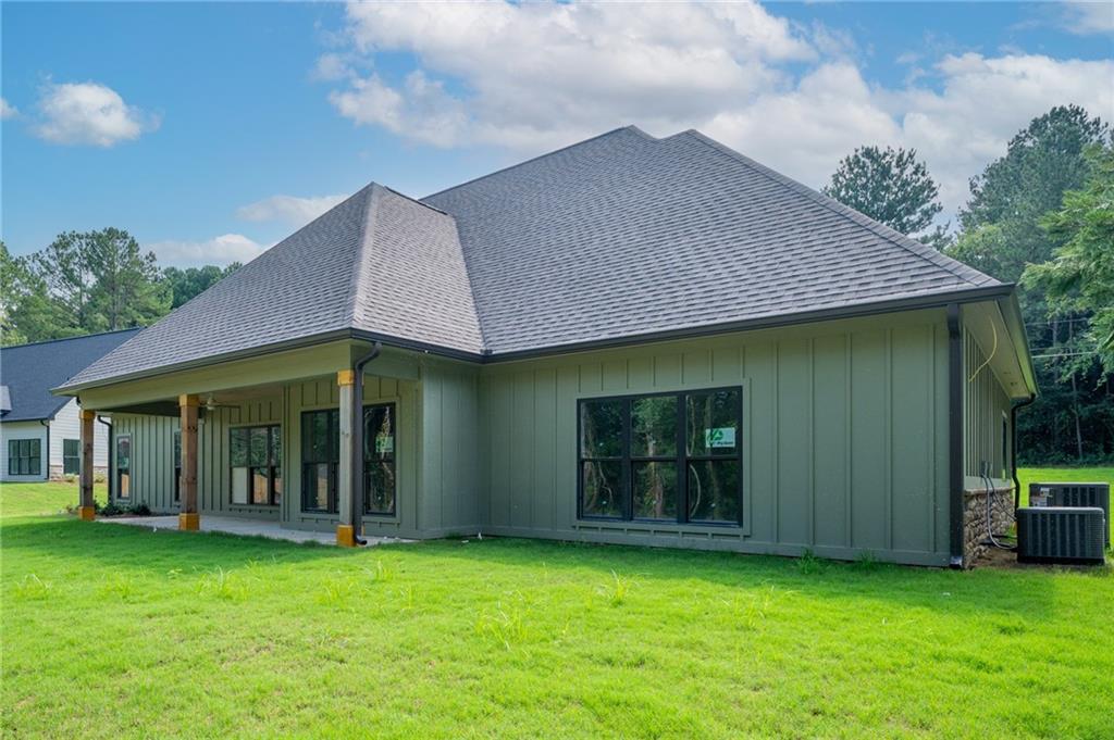 130 Cambridge Court Calhoun, GA 30701 - Photo 45 of 46 a view of a house with garden and porch