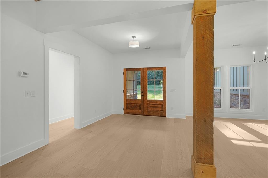 130 Cambridge Court Calhoun, GA 30701 - Photo 6 of 46 a view of an empty room with a window