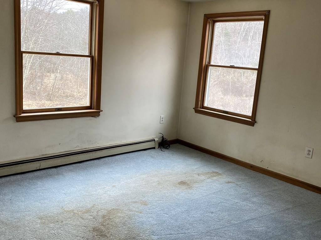 245 Brookfield Road Brimfield, MA 01010 - Photo 14 of 17 an empty room with a window
