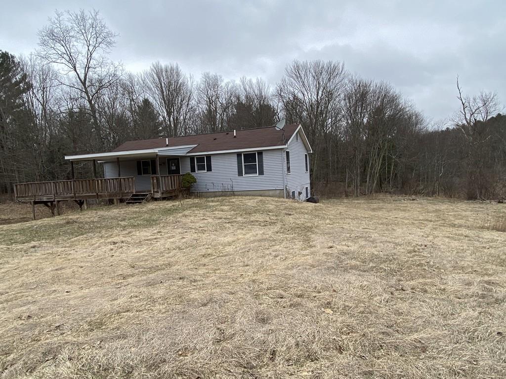 245 Brookfield Road Brimfield, MA 01010 - Photo 2 of 17 a view of house with outdoor space and garden
