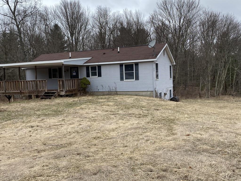 245 Brookfield Road Brimfield, MA 01010 - Photo 3 of 17 a view of a house with a yard