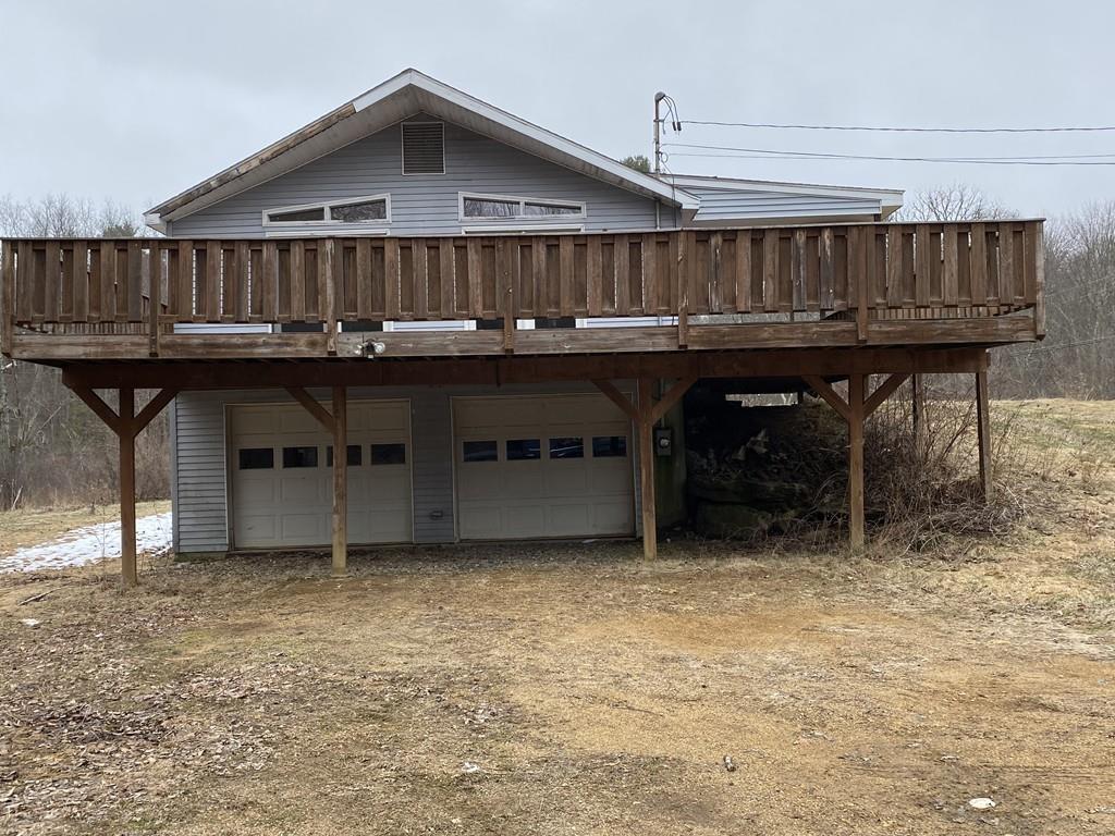 245 Brookfield Road Brimfield, MA 01010 - Photo 5 of 17 a view of backyard with wooden deck and furniture