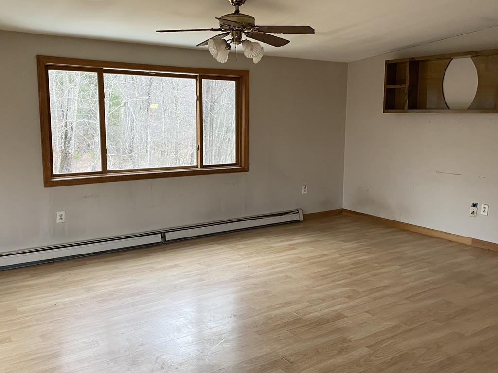 245 Brookfield Road Brimfield, MA 01010 - Photo 8 of 17 en empty room with windows