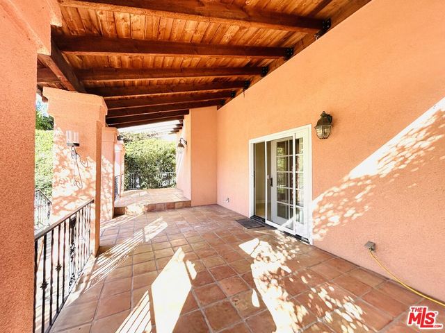 a view of an empty room with a fireplace