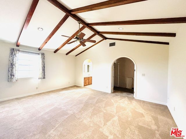 a spacious bathroom with a double vanity sink mirror and