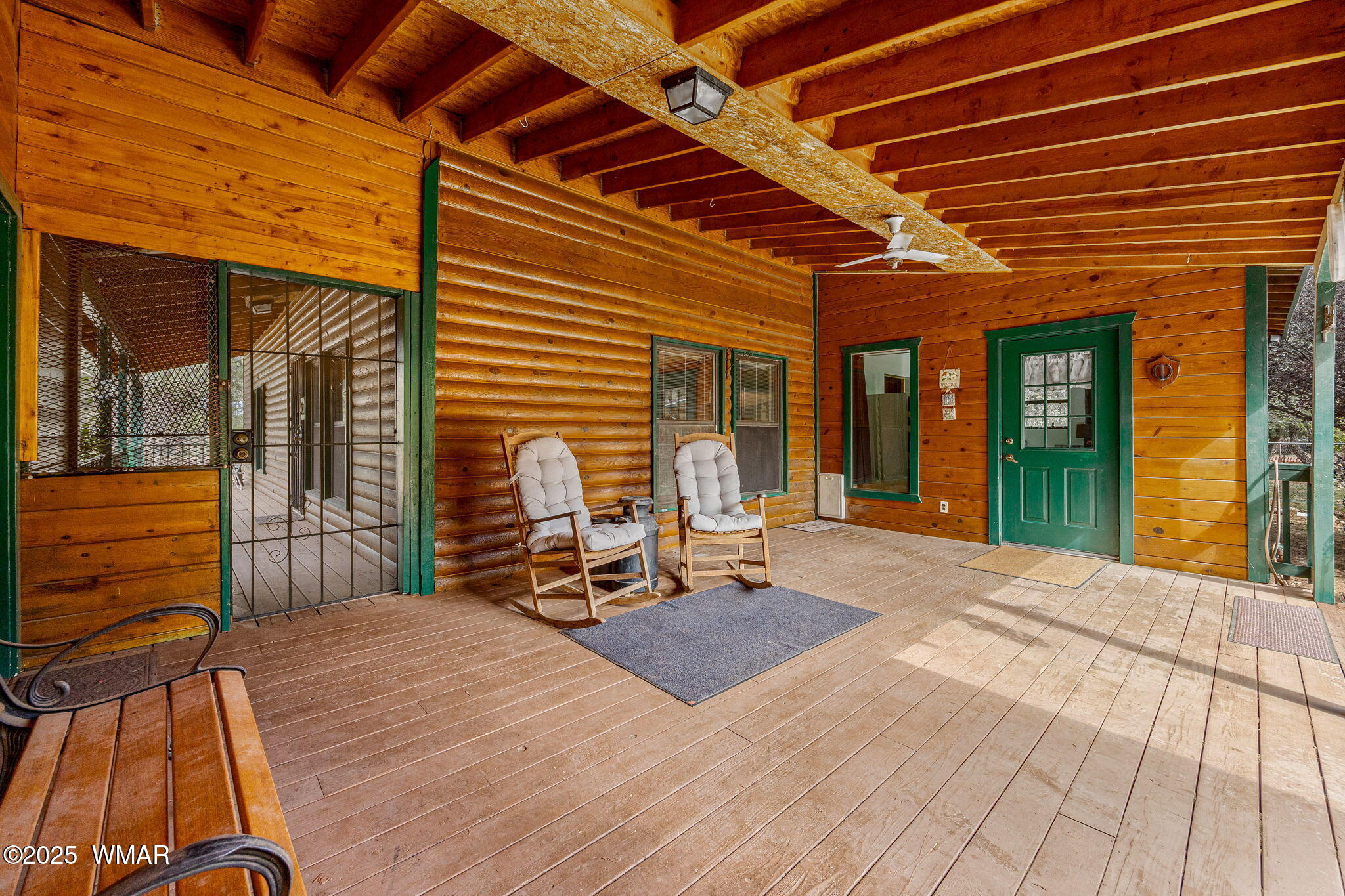 2933 Wildcat Trail Overgaard, AZ 85933 - Photo 28 of 44 a view of a lounge chairs in the porch