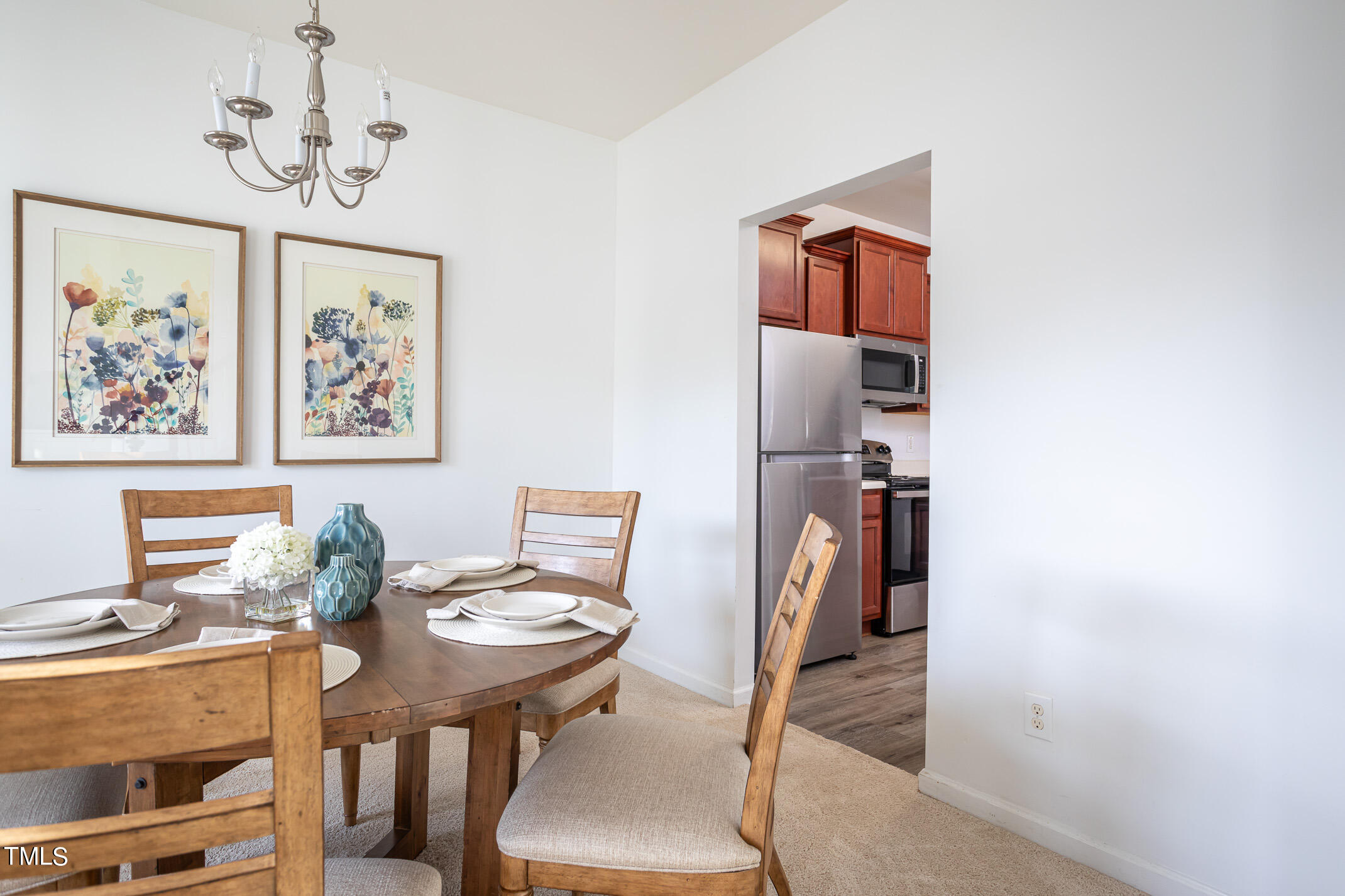 2532 Follow Me Way Raleigh, NC 27610 - Photo 8 of 39 a view of a room that has a table and chairs in it