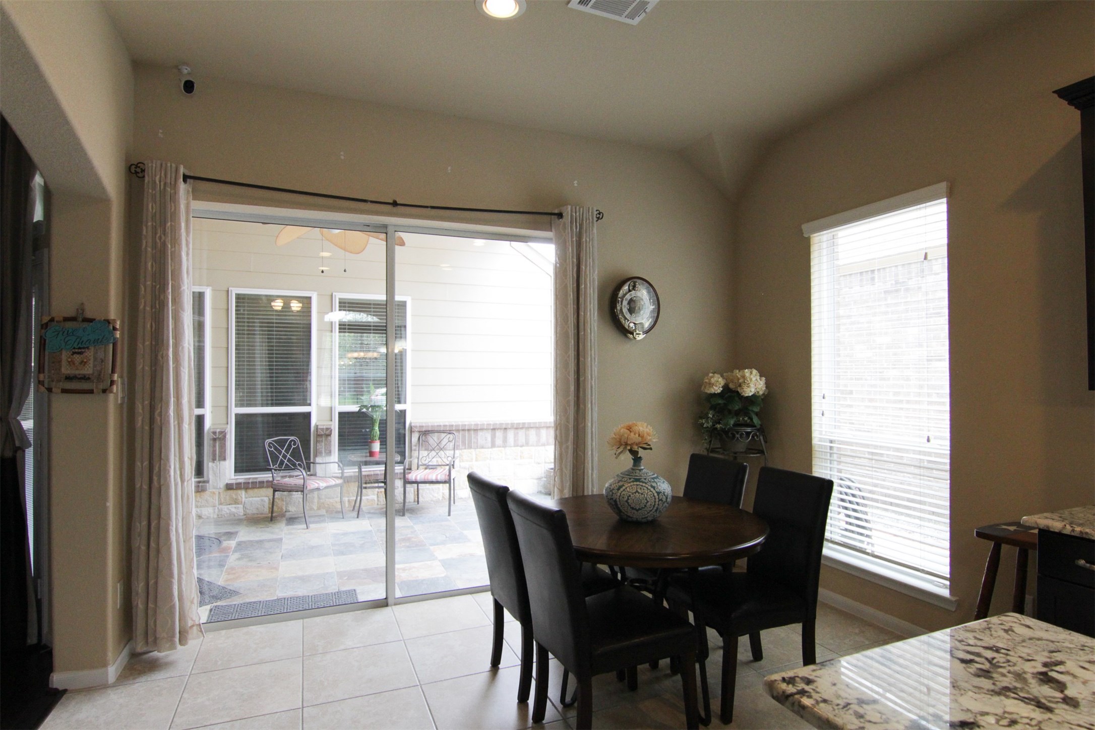 1423 Ralston Branch Way Sugar Land, TX 77479 - Photo 15 of 43 view of breakfast from kitchen, looking out to back patio through sliding glass doors