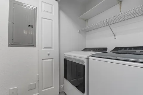 a utility room with dryer and washer