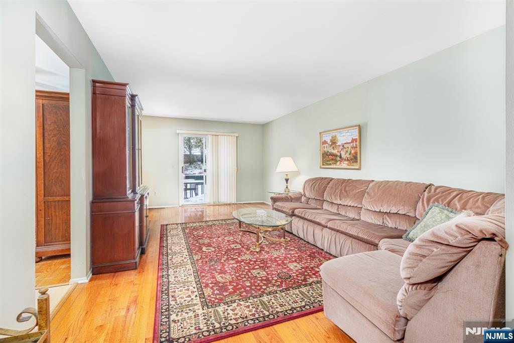 44 Mill Pond Road Little Falls, NJ 07424 - Photo 13 of 37 a living room with furniture and a couch
