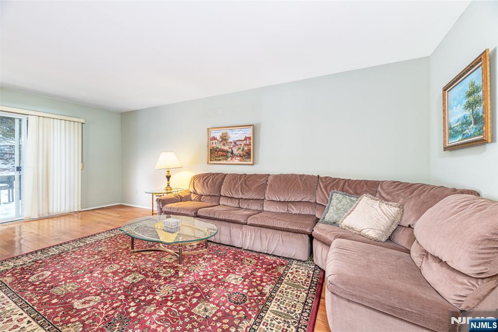 44 Mill Pond Road Little Falls, NJ 07424 - Photo 14 of 37 a living room with furniture and a couch