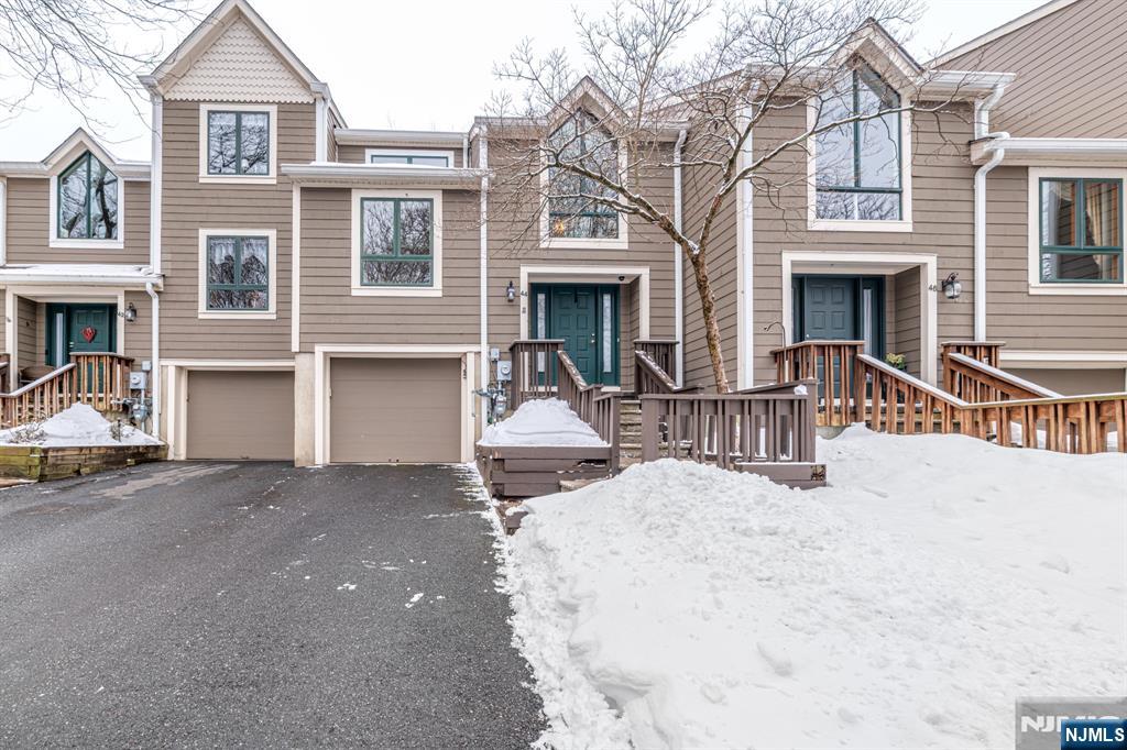 44 Mill Pond Road Little Falls, NJ 07424 - Photo 2 of 37 a view of a house with couches in front of house