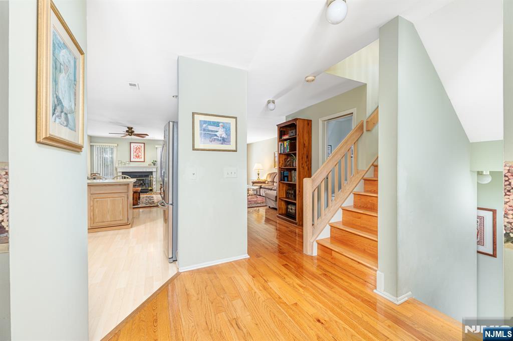44 Mill Pond Road Little Falls, NJ 07424 - Photo 22 of 37 a view of a living room with wooden floor