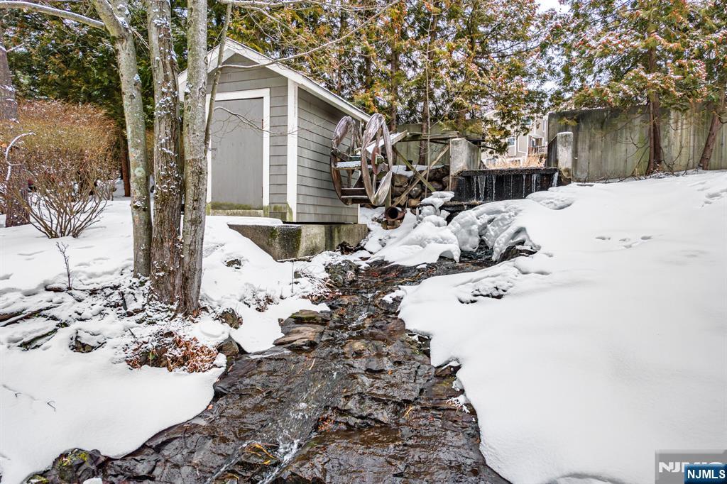 44 Mill Pond Road Little Falls, NJ 07424 - Photo 35 of 37 a view of snow on the roadside
