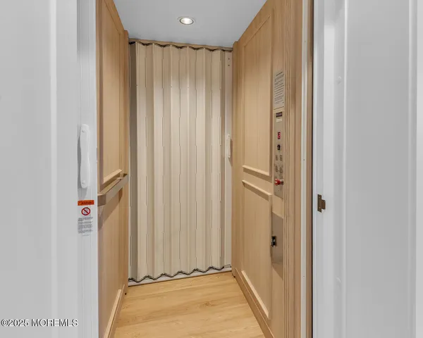 a view of a room with rack on the wall