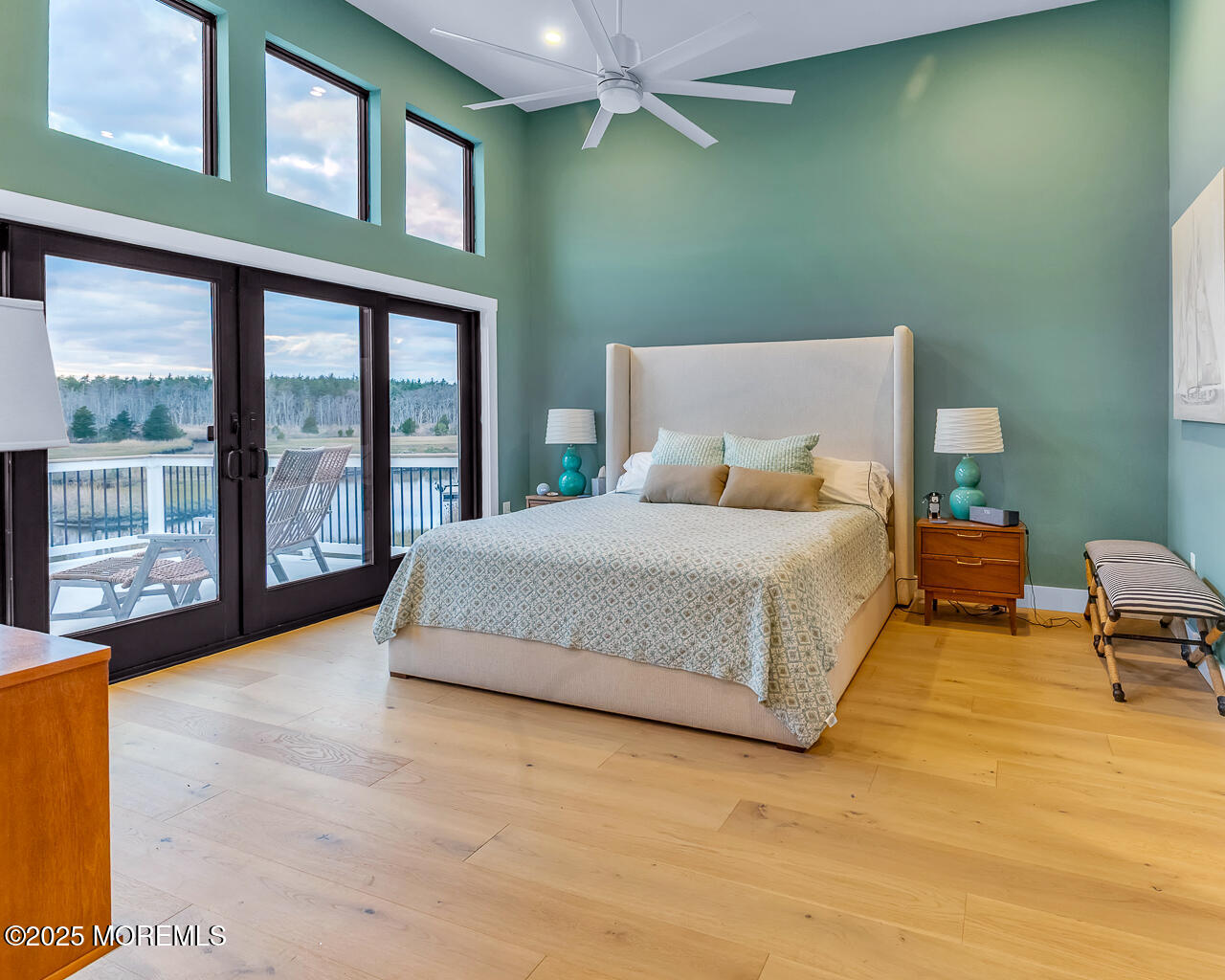 637 Cedar Run Dock Road West Creek, NJ 08092 - Photo 21 of 51 a spacious bedroom with a large bed and a large window
