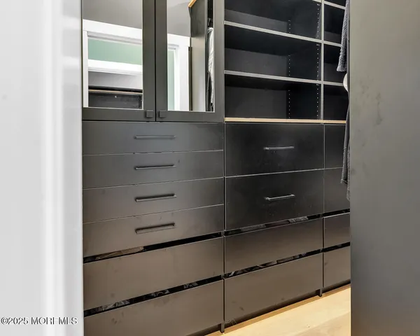 a bathroom with a toilet a sink and bathtub