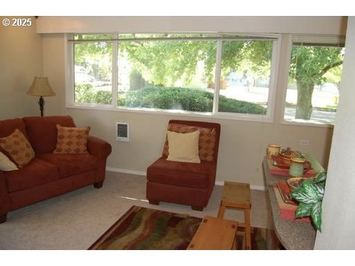 1735 Cleveland Place Eugene, OR 97402 - Photo 5 of 6 a living room with furniture and a large window