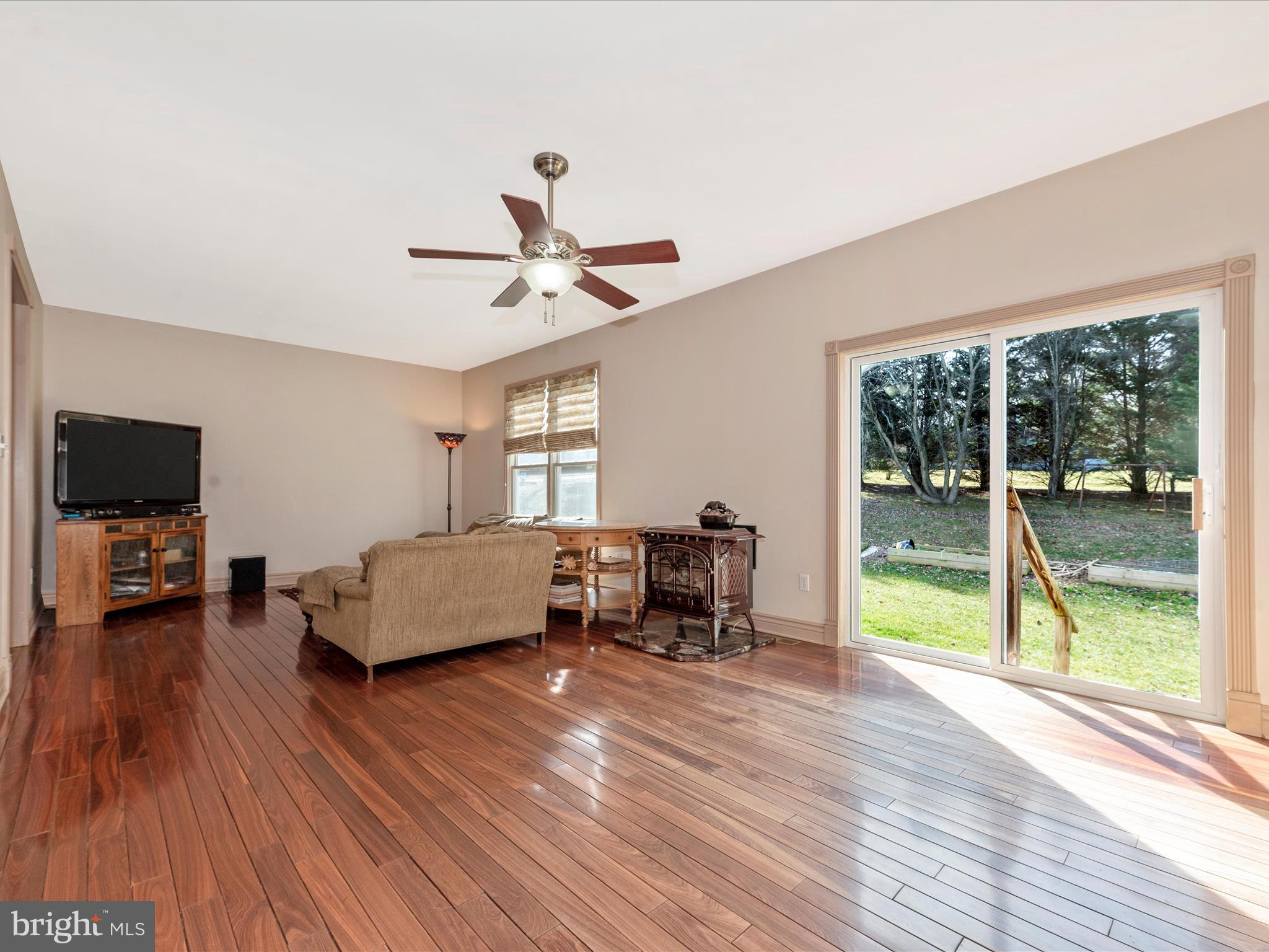 13128 Jesse Smith Road Mount Airy, MD 21771 - Photo 16 of 57 Family Room with gas stove