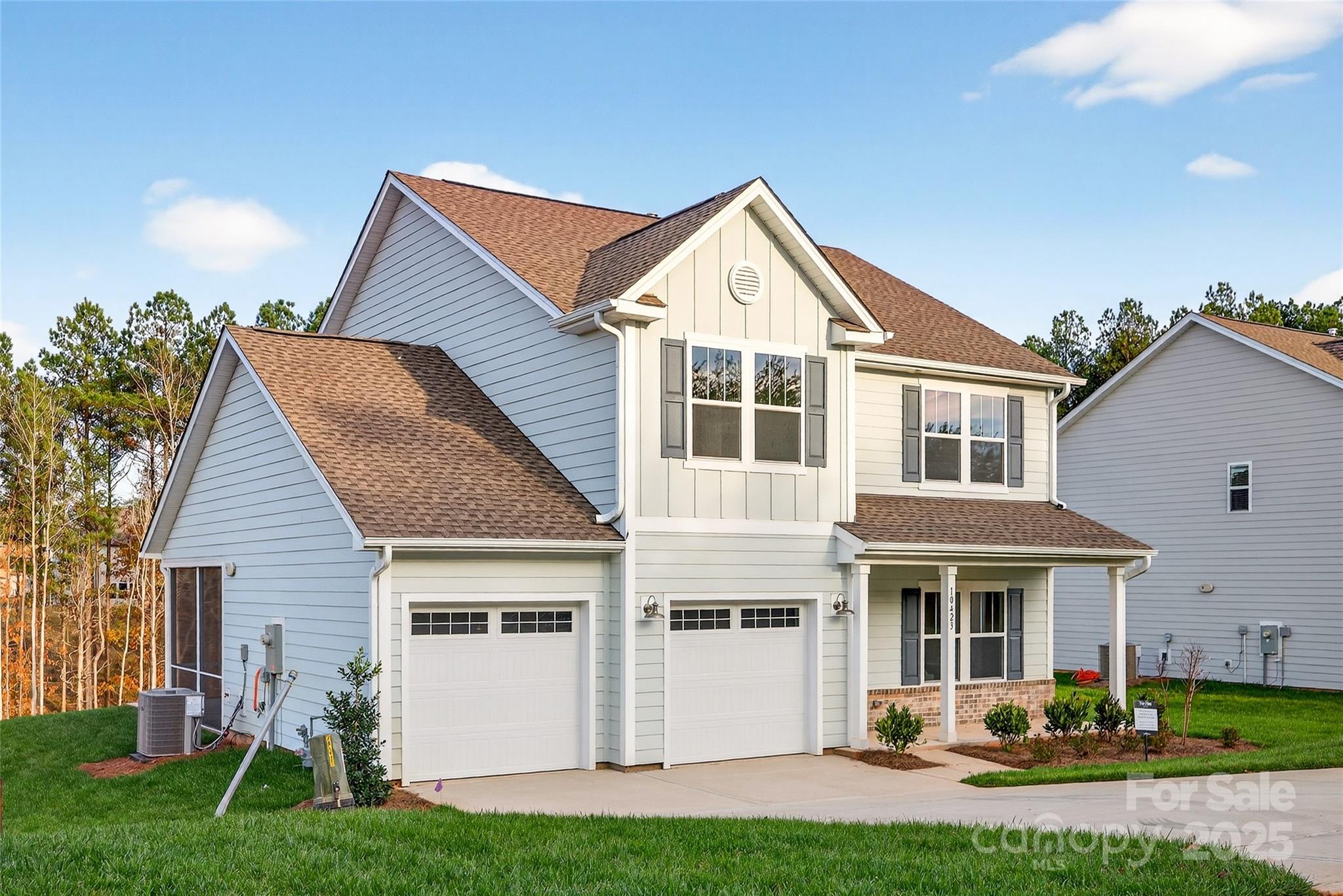 10423 Lakeshore Drive, Unit 71 Lancaster, SC 29720 - Photo 2 of 31 a front view of a house with a yard