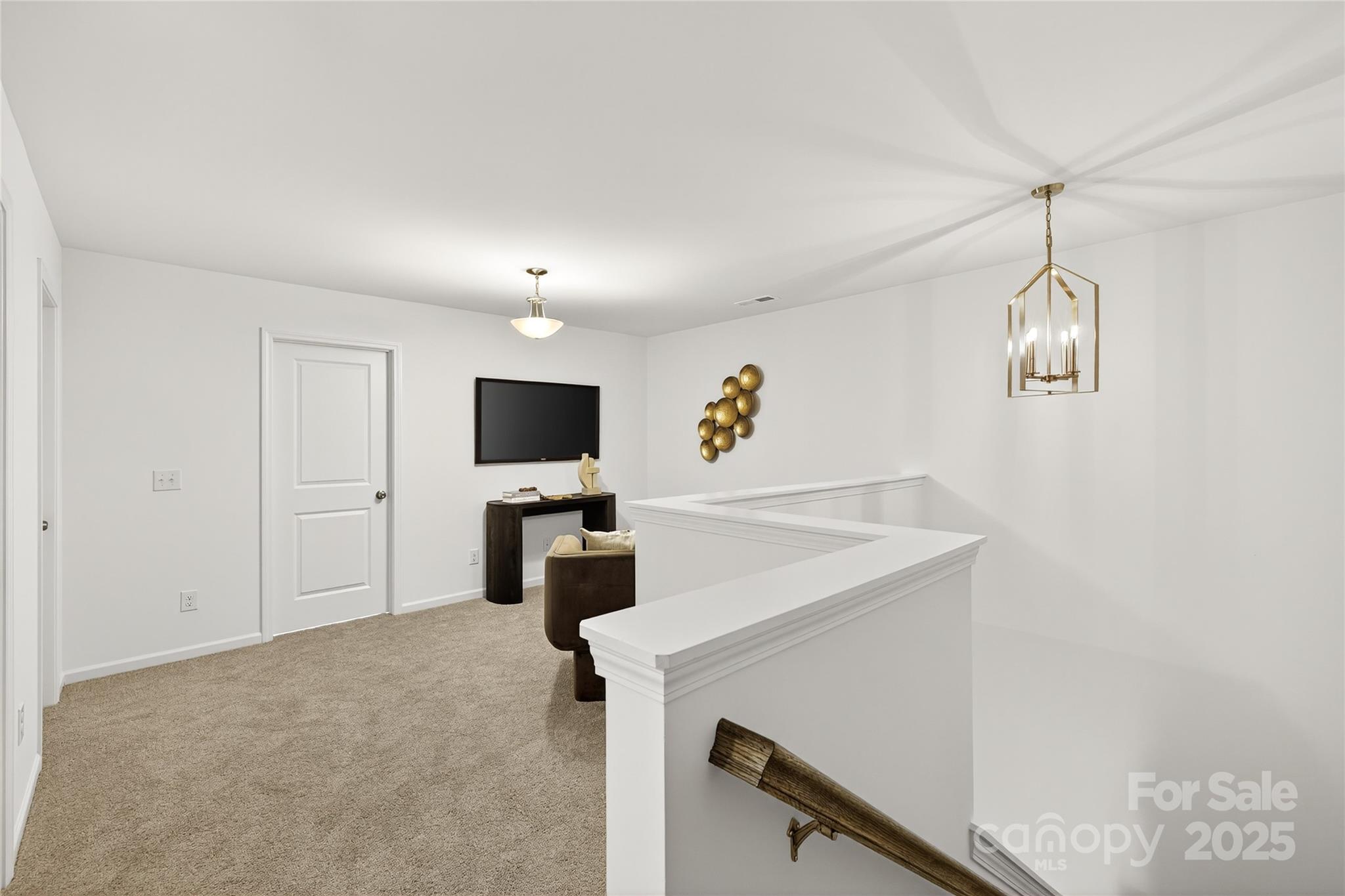 10423 Lakeshore Drive, Unit 71 Lancaster, SC 29720 - Photo 24 of 31 a view of a room with flat screen tv