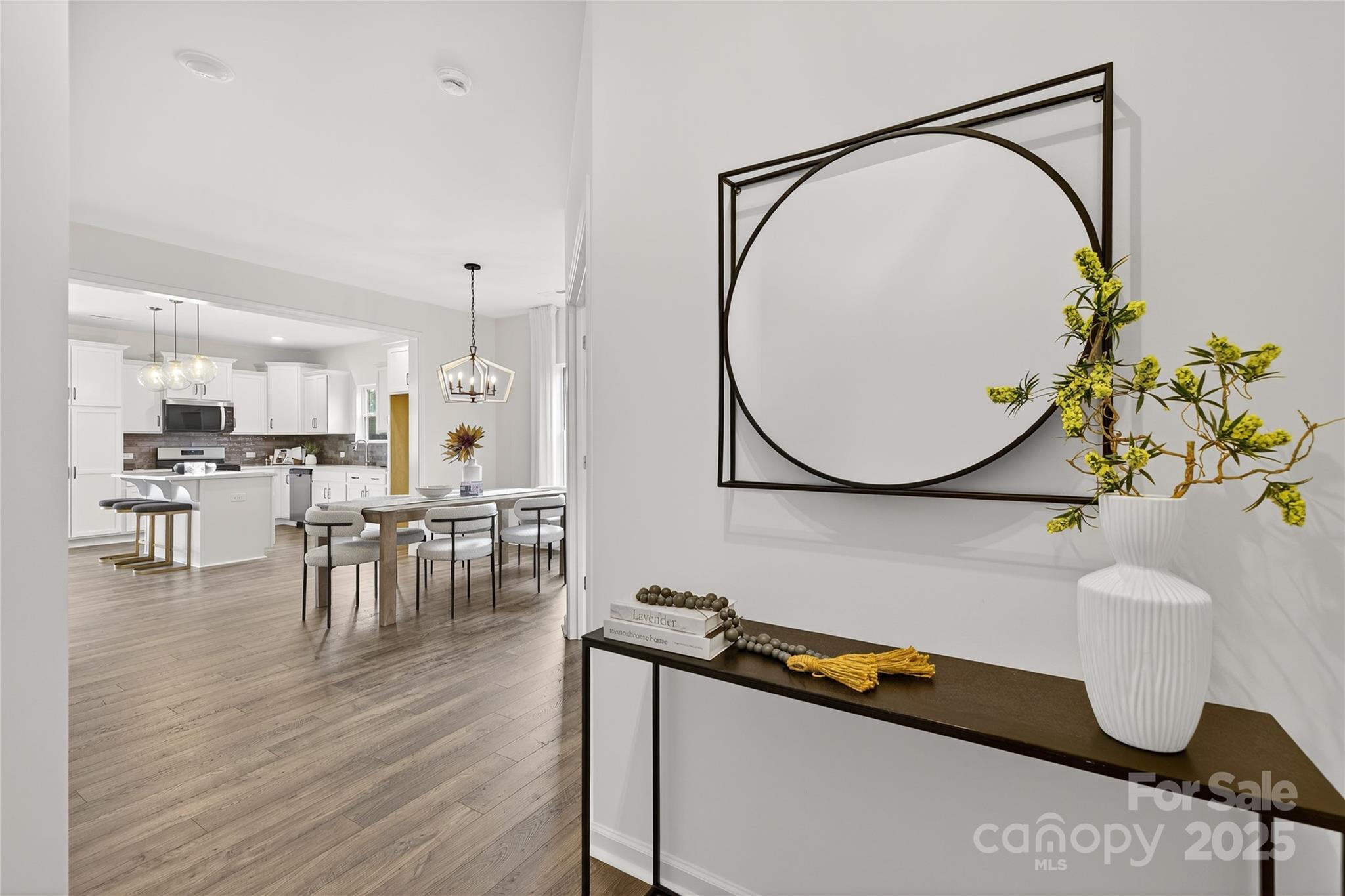 10423 Lakeshore Drive, Unit 71 Lancaster, SC 29720 - Photo 28 of 31 a living room with furniture and a wooden floor