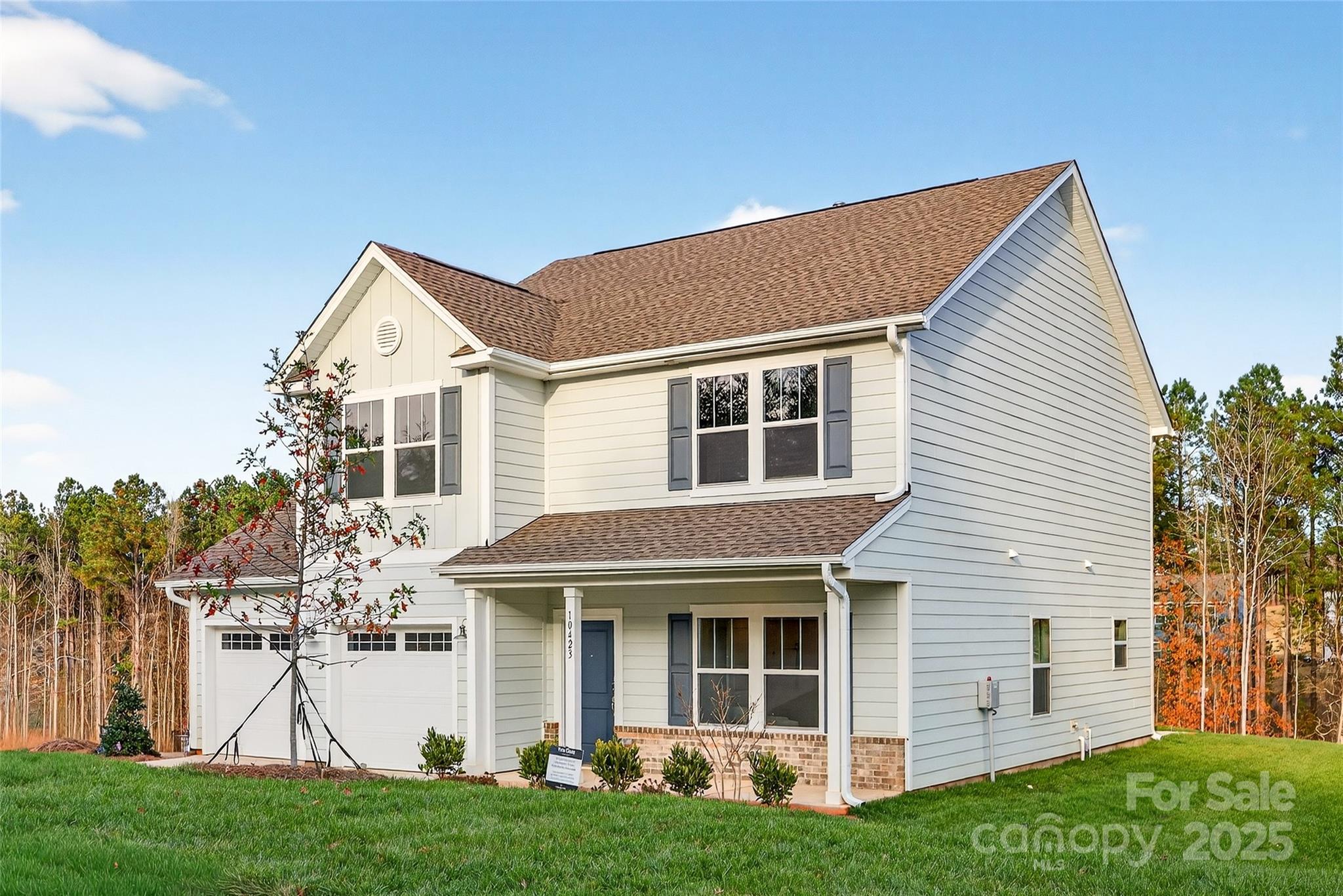 10423 Lakeshore Drive, Unit 71 Lancaster, SC 29720 - Photo 3 of 31 a view of a house with a yard