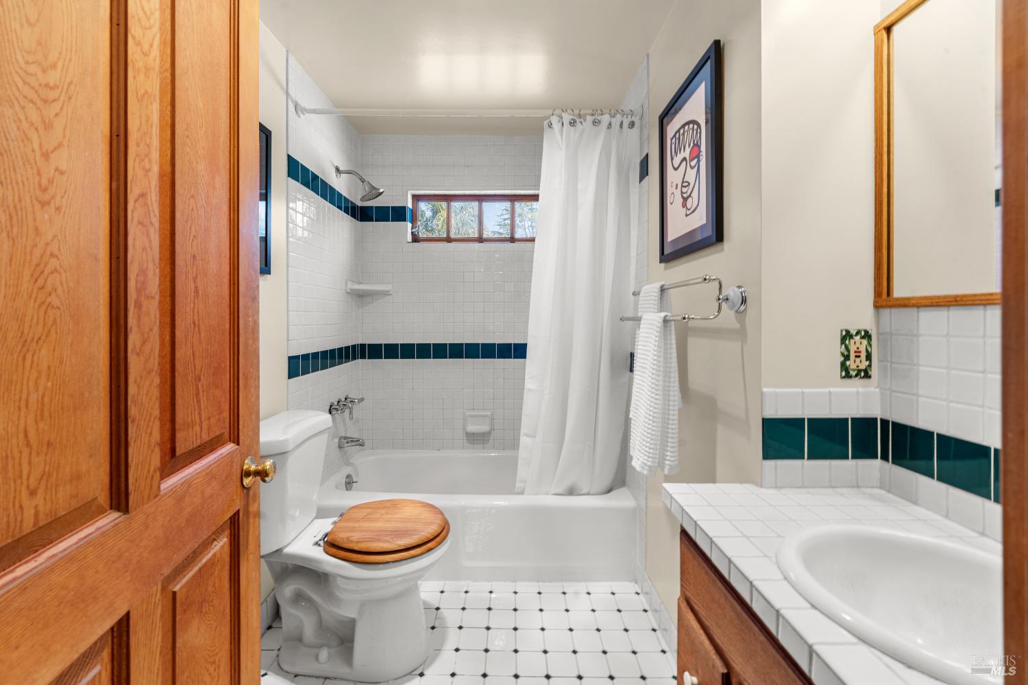 309 Hendley Street Santa Rosa, CA 95404 - Photo 14 of 31 a bathroom with a sink toilet and shower
