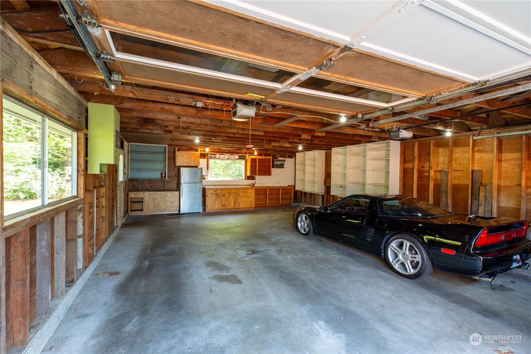 8498 Talbot Road Edmonds, WA 98026 - Photo 30 of 30 a car that is parked in a garage