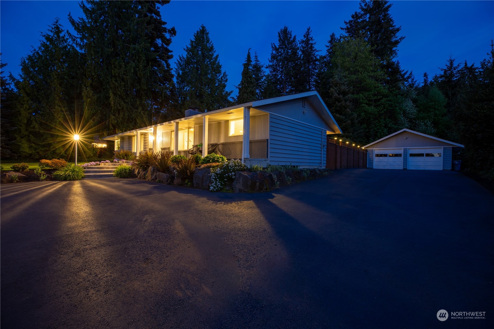 8498 Talbot Road Edmonds, WA 98026 - Photo 3 of 30 a view of a street with cars parked on the road