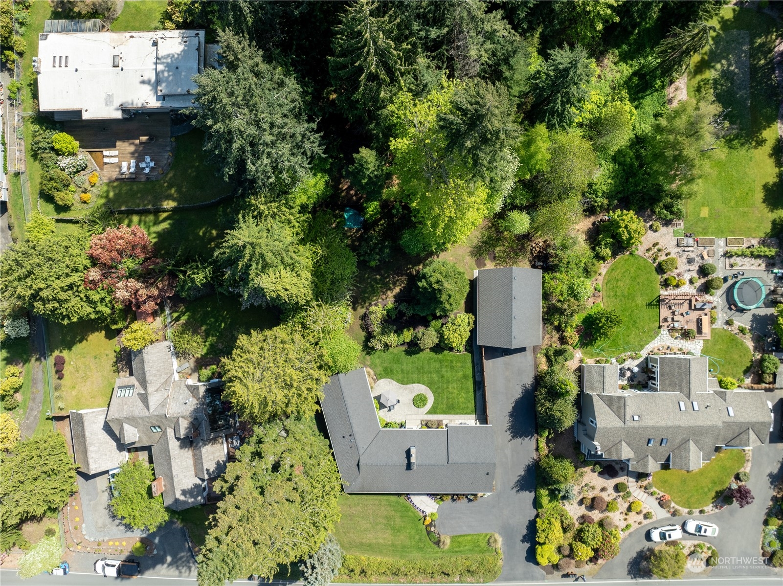 8498 Talbot Road Edmonds, WA 98026 - Photo 5 of 30 an aerial view of a house with a yard and garden