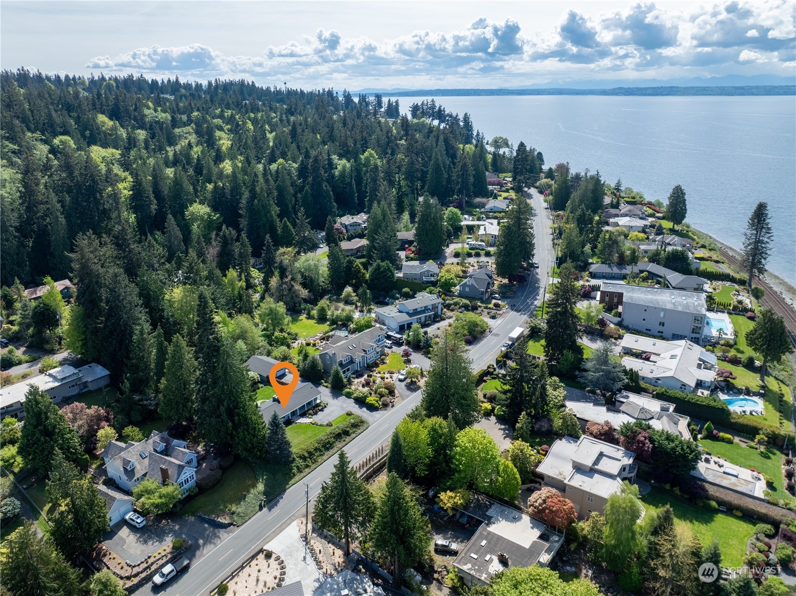 8498 Talbot Road Edmonds, WA 98026 - Photo 7 of 30 a view of a lake with a house in the background