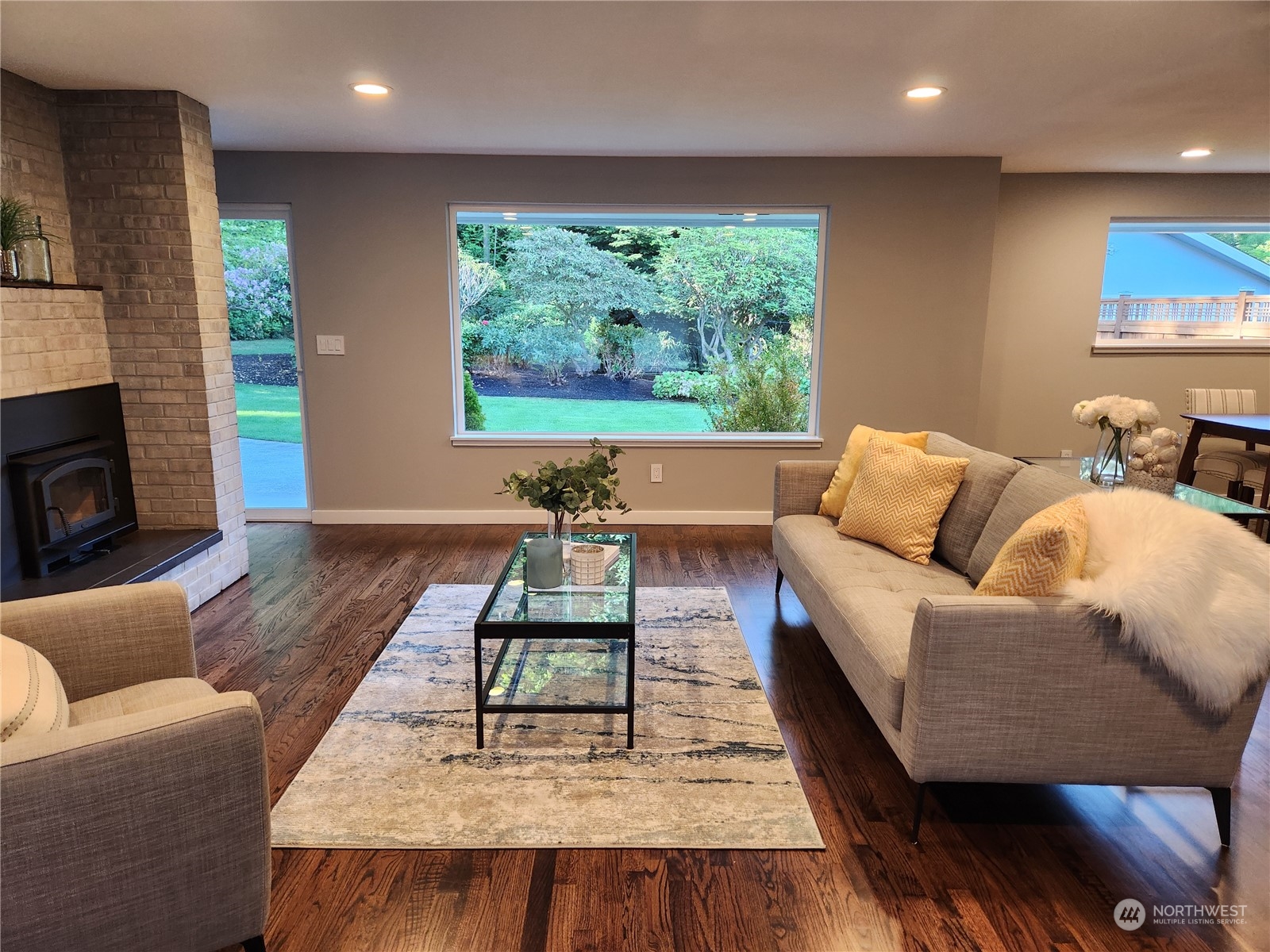 8498 Talbot Road Edmonds, WA 98026 - Photo 9 of 30 a living room with furniture rug and window