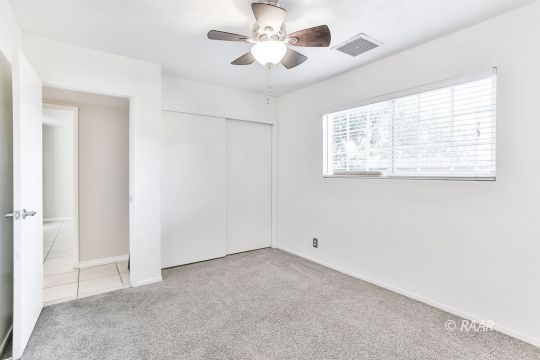 528 South Sorrel Street Ridgecrest, CA 93555 - Photo 18 of 27 a view of an empty room with a window