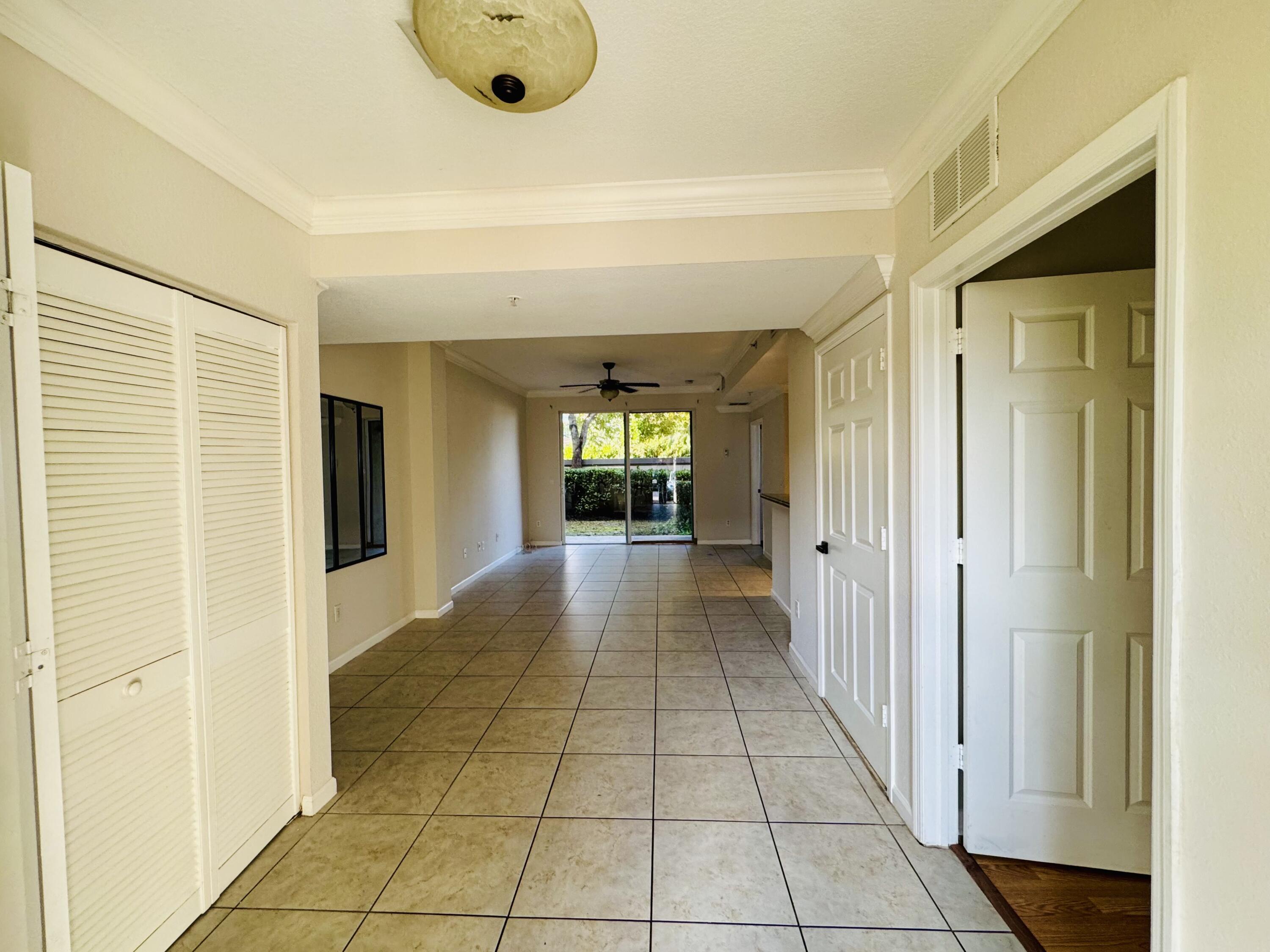 1954 Freeport Drive, Unit 1954 Riviera Beach, FL 33404 - Photo 2 of 17 IMG_5461